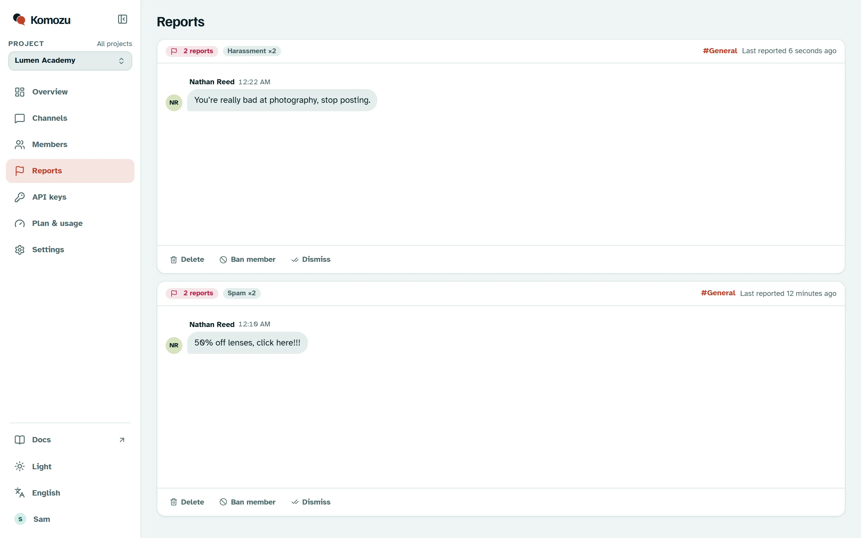 Komozu dashboard reports page with a message reported twice as spam